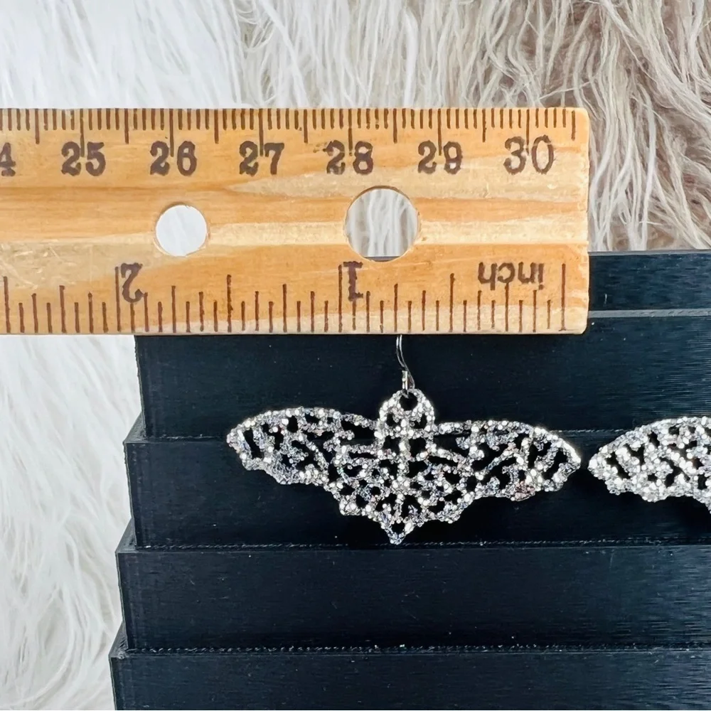 Pretty Silvertone bling bat costume pierced earrings